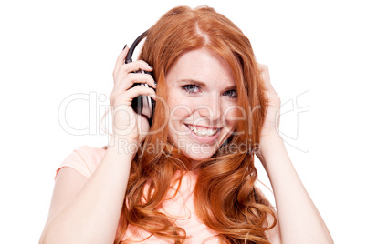 attractive happy woman with headphones listen to music isolated