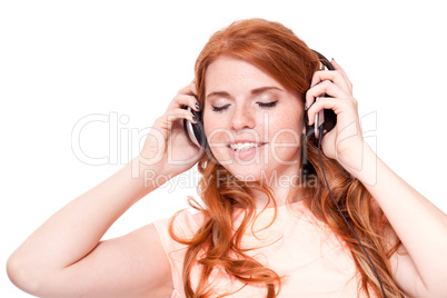 attractive happy woman with headphones listen to music isolated