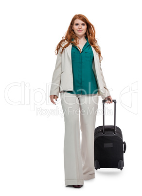 Business woman carrying luggage