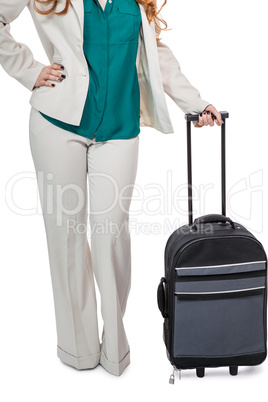 Business woman carrying luggage