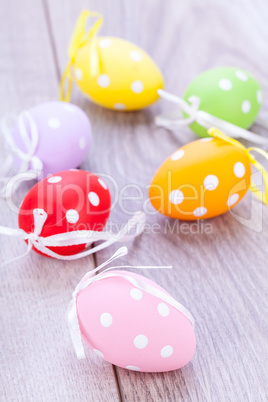 colorful easter egg decoration on wooden background