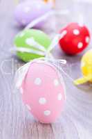 colorful easter egg decoration on wooden background