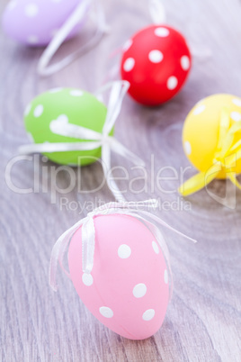 colorful easter egg decoration on wooden background