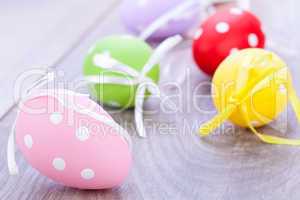 colorful easter egg decoration on wooden background