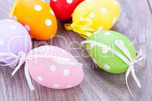 colorful easter egg decoration on wooden background