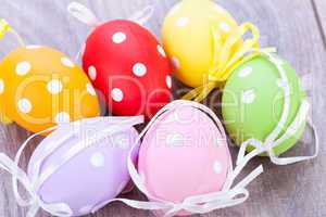 colorful easter egg decoration on wooden background