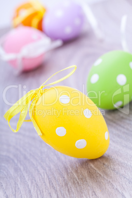 colorful easter egg decoration on wooden background