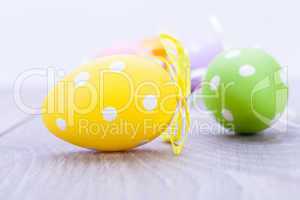 colorful easter egg decoration on wooden background