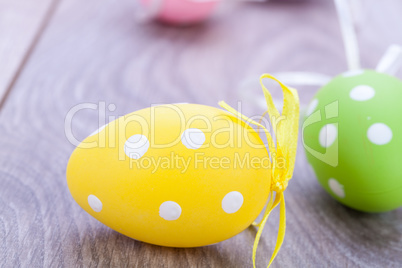 colorful easter egg decoration on wooden background