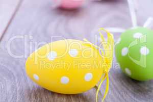 colorful easter egg decoration on wooden background