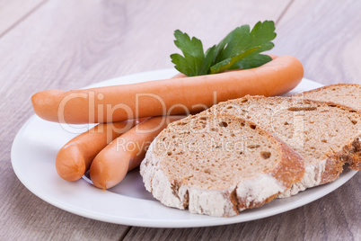 tasty sausages frankfurter with grain bread