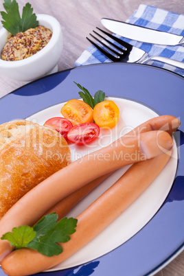 tasty sausages frankfurter with grain bread