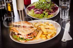 Club sandwich with potato French fries