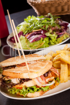 Club sandwich with potato French fries