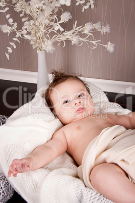 sweet little baby infant toddler on blanket in basket