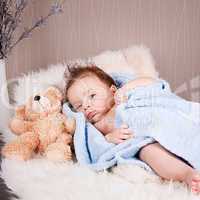 cute little baby todler infant lying on blanket