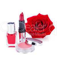 Fashionable cosmetics with a fresh red rose
