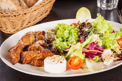 grilled beef stripes fresh salad and goat cheese