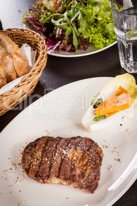 Grilled beef steak with seasoning