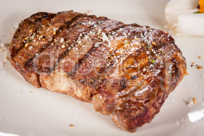 Grilled beef steak with seasoning