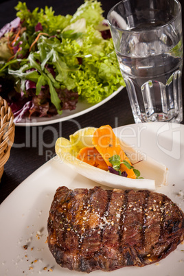 Grilled beef steak with seasoning