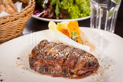 Grilled beef steak with seasoning