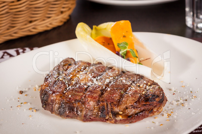 Grilled beef steak with seasoning