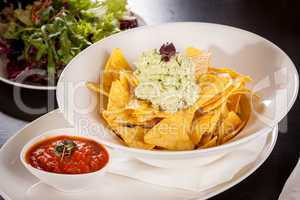 Crisp corn nachos with guacamole sauce