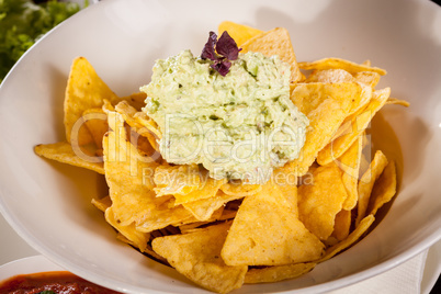 Crisp corn nachos with guacamole sauce