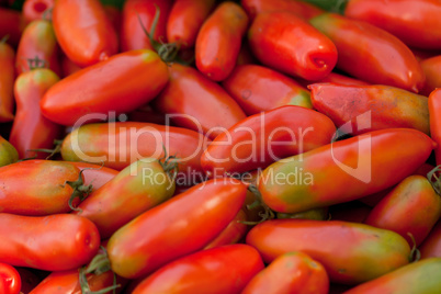 fresh red tomatoes on market