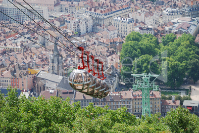 Cable cars over the city Grenoble.