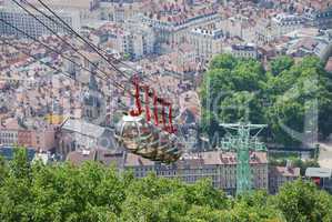 Cable cars over the city Grenoble.