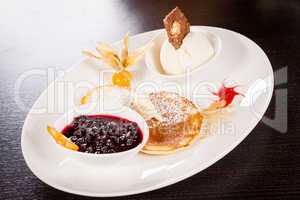 tasty sweet pancakes with vanilla icecream and topping