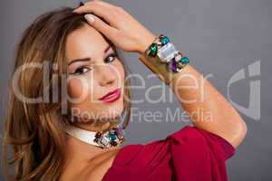 attractive brunette woman with glamour jewellry
