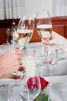 happy smiling couple in restaurant celebrate