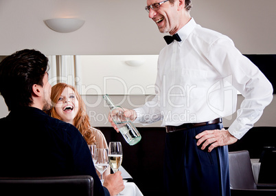 man and woman for dinner in restaurant