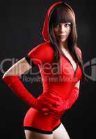 Young woman in the bodysuit with a hood.