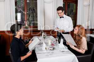 young smiling couple at the restaurant