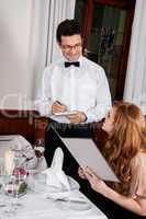 young smiling couple at the restaurant