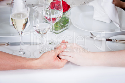 happy smiling couple in restaurant celebrate