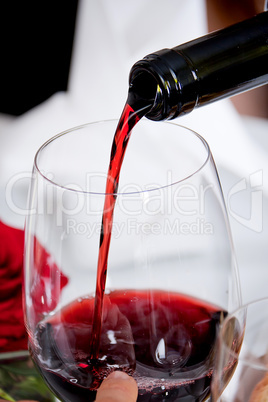 couple drinking red wine in restaurant