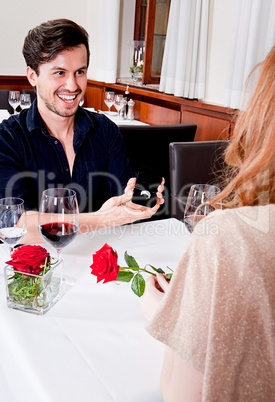 happy couple in restaurant romantic date