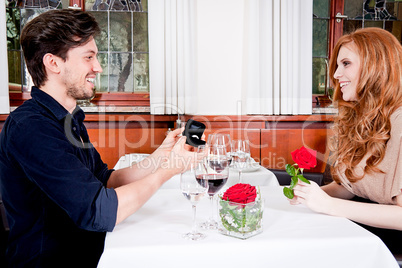 happy couple in restaurant romantic date