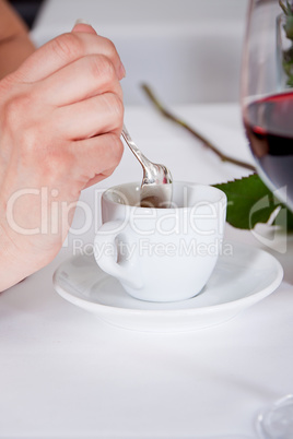 waiter serve fresh espresso for happy couple