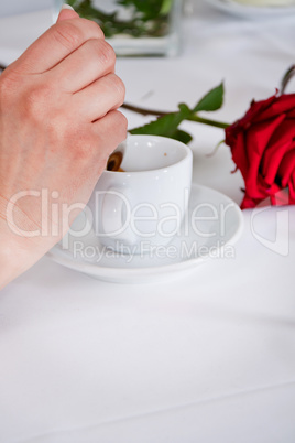 waiter serve fresh espresso for happy couple