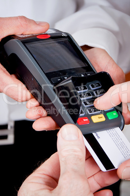 dinner in restaurant man and woman pay by credit card