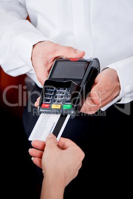 dinner in restaurant man and woman pay by credit card