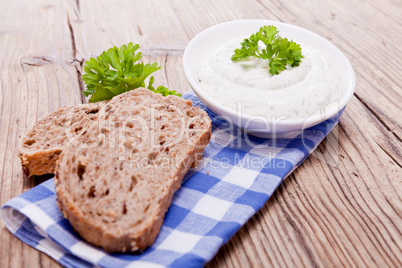 fresh tasty herbal creme cheese and bread