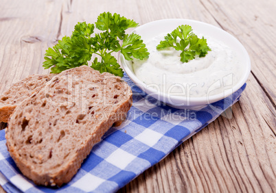 fresh tasty herbal creme cheese and bread