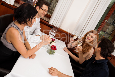 smiling happy people friends in restaurant